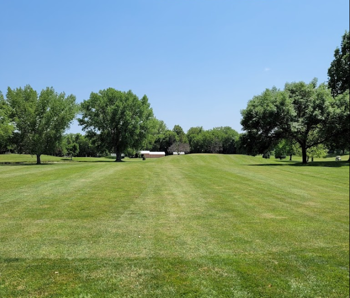 view of the fairway with the club buildings in the far background